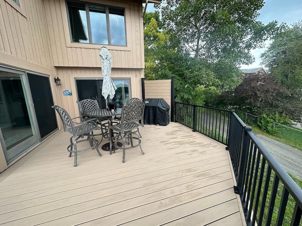 Side-by-side comparison of composite decking and wood decking boards