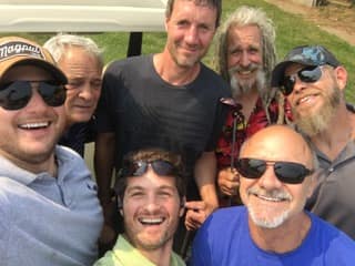 The All American Remod crew together outdoors